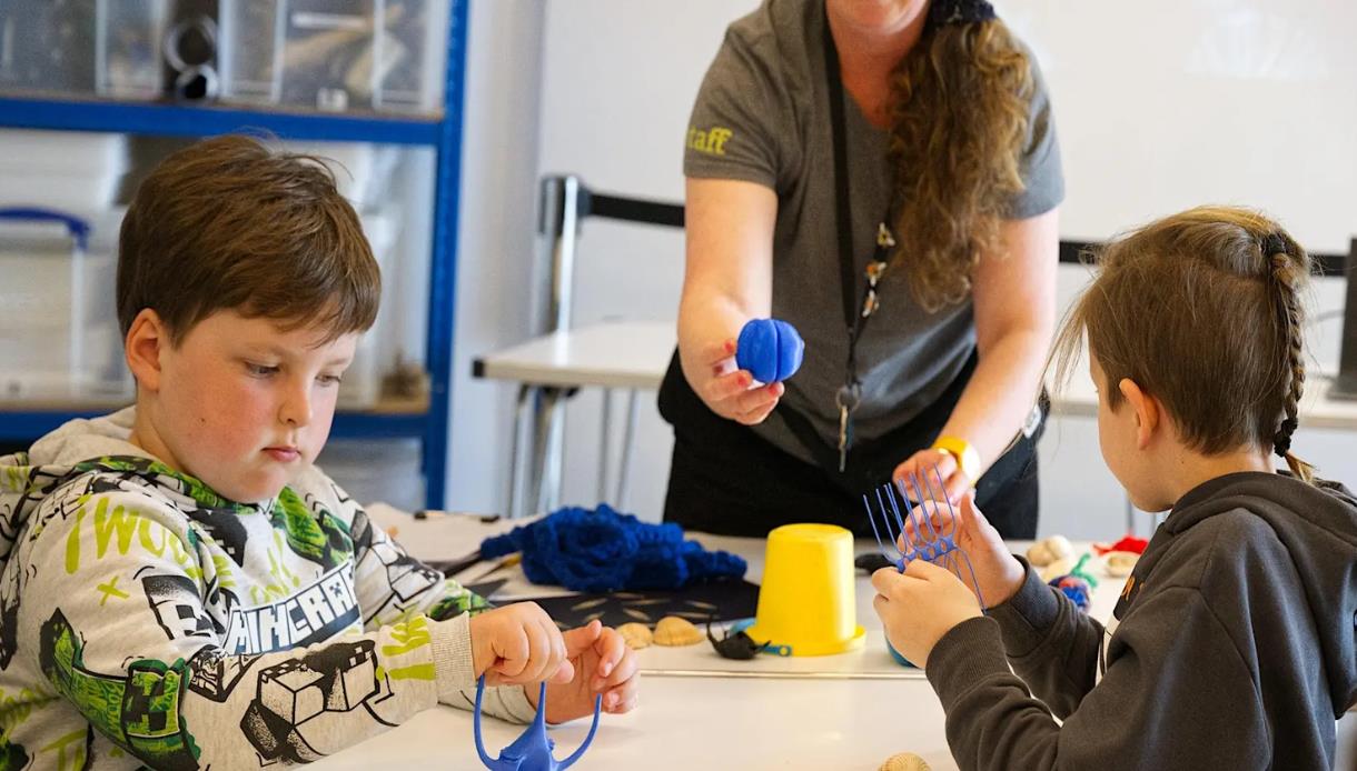 Children take part in a hands-on coastal wildlife activity led by staff at Rye Harbour Nature Reserve.