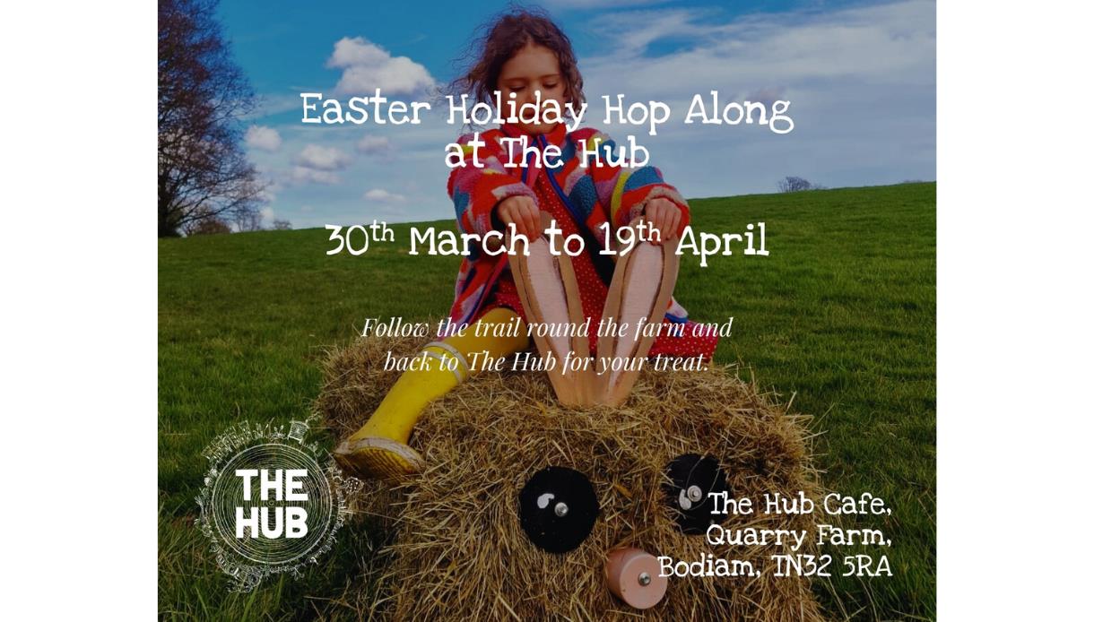 Child sitting on a straw Easter character advertising the Easter Holiday Hop Along at The Hub, Bodiam, 30 March to 19 April.
