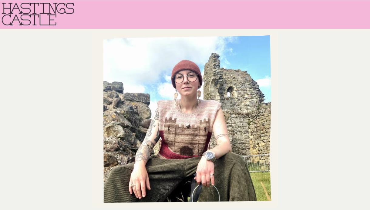 Promotional image for Beyond the Battle History Tours, showing a guide seated beside the ruins of Hastings Castle.