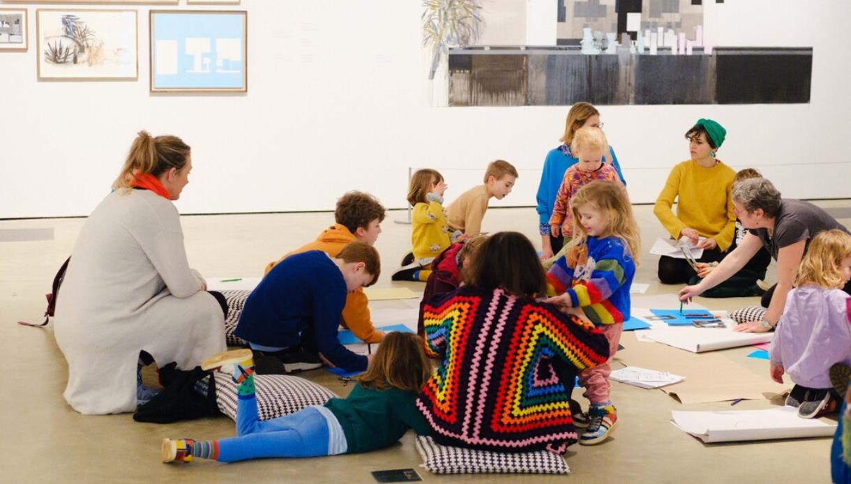 Families taking part in creative art activities during a Family Day workshop at Hastings Contemporary gallery.
