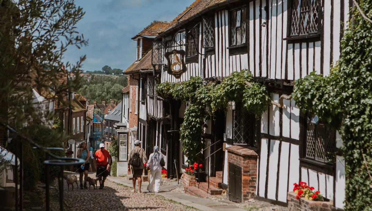 The Mermaid Inn on historic Mermaid Street in Rye, a timber-framed Tudor building draped with climbing greenery.