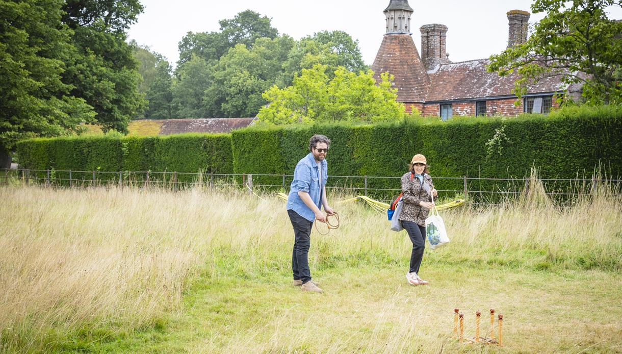 Summer of Play at Bateman’s, with visitors enjoying traditional lawn games in the grounds of the historic house.