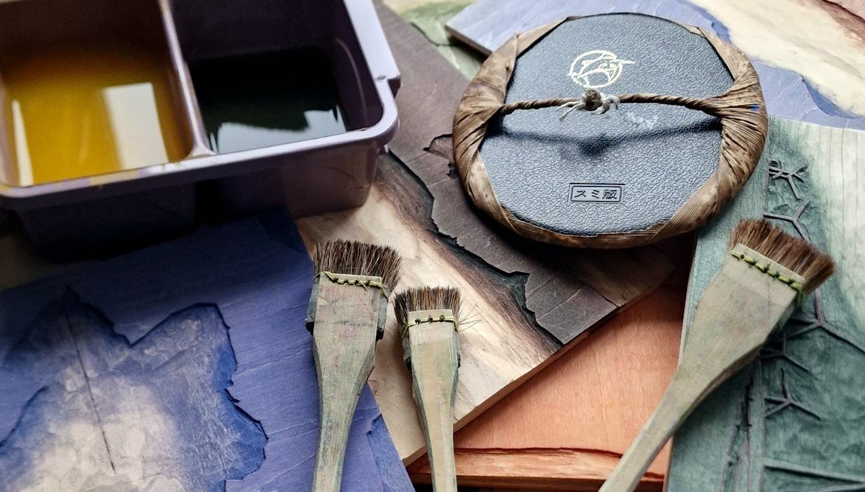 Image shows the tools used for Japanese Woodblock Printing including brushes and ink.