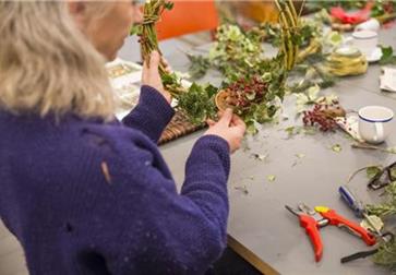 Lady making a wreath