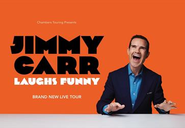 Jimmy Carr on an orange background