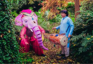 Elephant and trainer