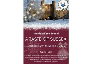 A festive event poster for Battle Abbey School’s Christmas Fayre. The top half shows a winter scene with Battle Abbey’s historic stone building in the