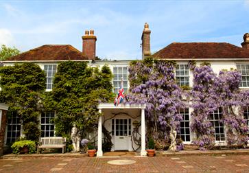 Exterior of the main building of PowderMills Hotel