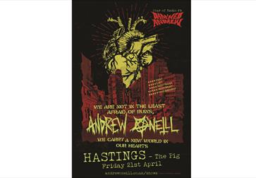 black and red poster for Andrew O'Neill at The Pig in Hastings. There is an illustration of a yellow heart.