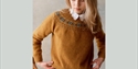 Photo of woman in knitwear sold by British Design British Made