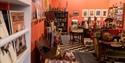 Interior of Tadhg Mae Projects in Hastings, showcasing books, artwork, gifts and eclectic displays