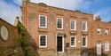 Exterior of Lamb House in Rye, a Georgian brick building with sash windows and a black front door