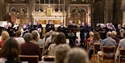 Singers of Hastings Philharmonic Orchestra on stage.