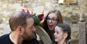 family inside a castle building.