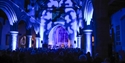 Audience watching a live performance inside an illuminated historic church at Rye Jazz Festival.