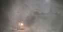 Foggy night scene at Pevensey with a costumed figure holding a lantern during Talking History event.