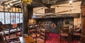 Fireplace and lounge at The Mermaid Inn, Rye