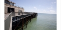 The western side of Hastings Pier, showing the Visitor Centre and cafe