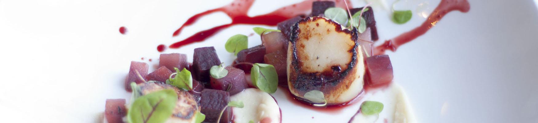Rye Bay Scallops served artily on plate