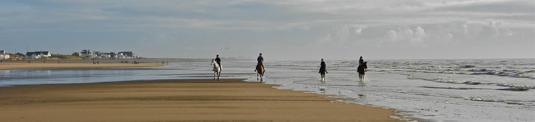 Horse riders on Camber beach
