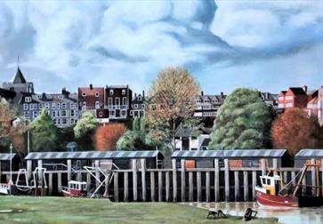 Painting of Rye Harbour. Shows small fishing boats moored with town and castle in the background.