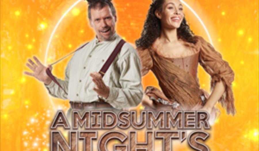 poster for midsummer nights dream with orange sparkly background and two characters inc man with donkey ears