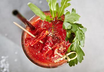 birds eye view of a bloody mary cocktail.