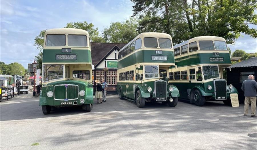 vintage green double decker buses.