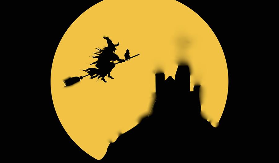 an illustration of a large yellow moon and silhouette of a witch on a broom stick.