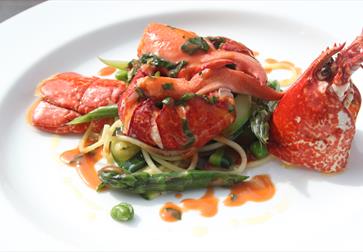 A gourmet lobster dish served plate.
