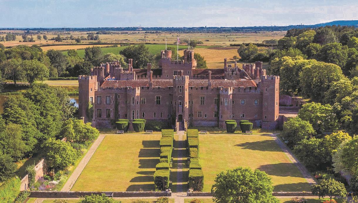aerial view of Herstmonceux Castle and formal grounds