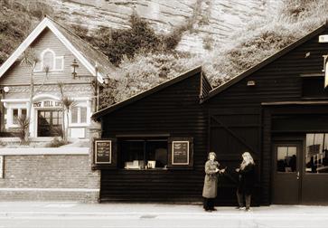 Exterior sepia tone picture of Rock-a-Nore Kitchen in Hastings Old Town, East Sussex