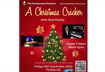 red poster wit graphic of christmas tree in the centre and two photographs added, one of a man next to a keyboard, the other of a stage. Title reads "