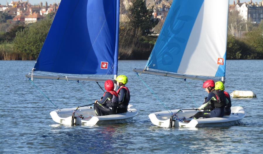 two windsails on the water.