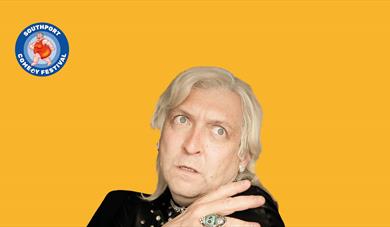 Image of character comedian of phoenix nights fame Clinton Baptiste
