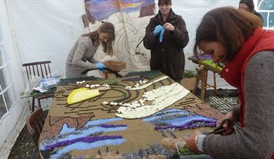 Well Dressers working on the creation of Hall Well