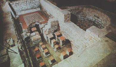 Famous Warm Room Mosaic and hypocaust at Chedworth Roman Villa