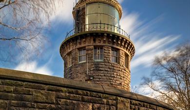 Bidston Lighthouse tower against a blue sky
