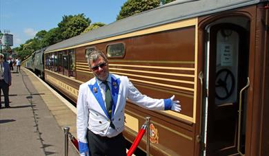 Andrew P.M. Wright next to 'Devon Belle' Observation Car