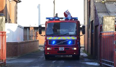Image of Santa on a fire engine