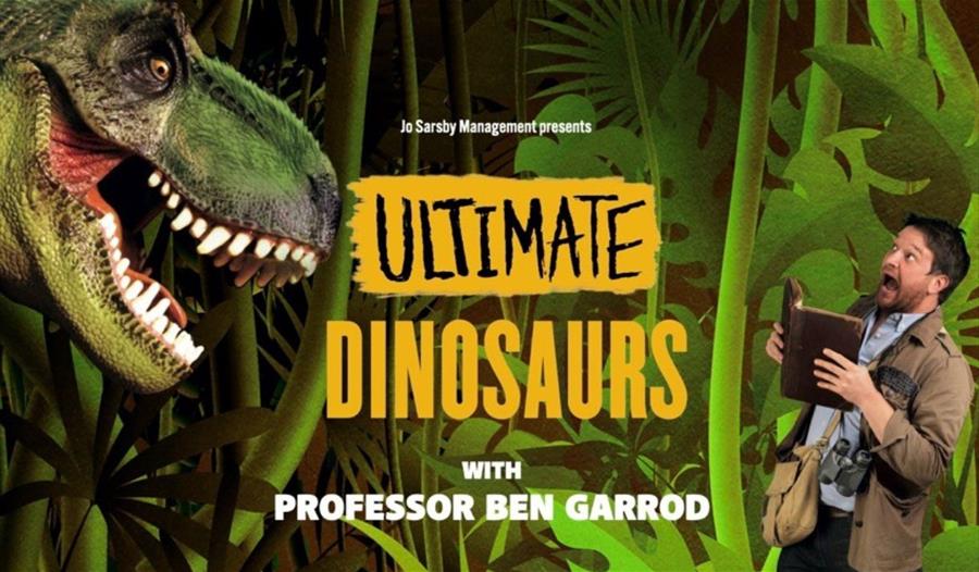 Prof Ben Garrod stand against a jungle background holding a book open with a shocked expression on his face. He's looking up to the left where a giant