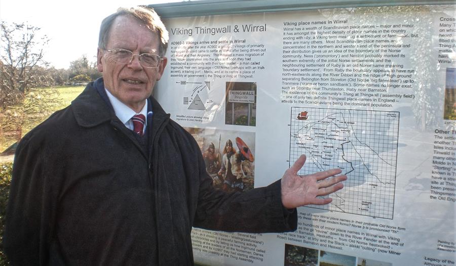 Professor Steve Harding stands in front of an information board.