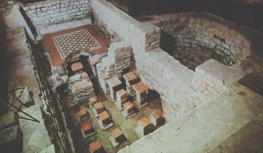 Famous Warm Room Mosaic and hypocaust at Chedworth Roman Villa