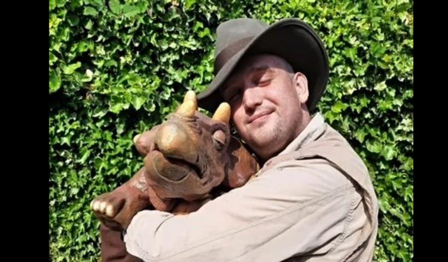 image of a puppet dinosaur and ranger