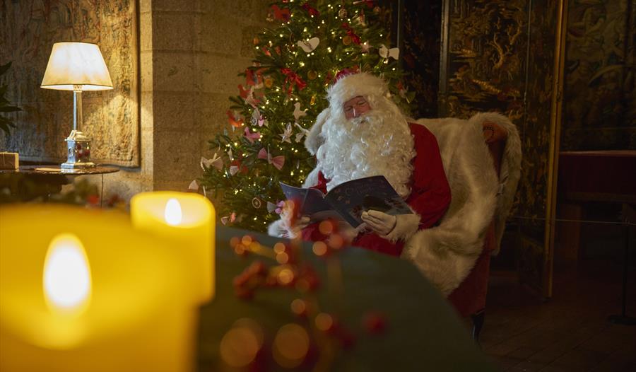 Father Christmas in the Library at Castle Drogo, Devon ©National Trust ImagesTrevor Ray Hart
