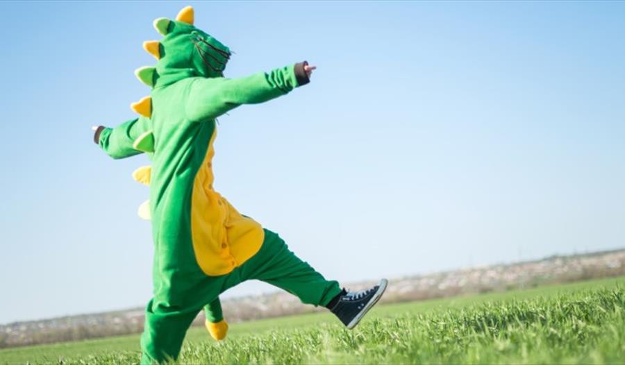 child dressed as a dragon St George’s Weekend