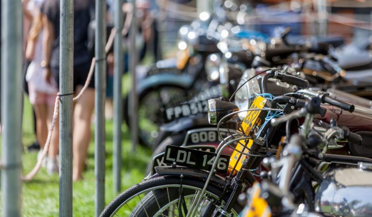 Isle of Wight, Events, Isle of Wight Steam Railway, Festival of Transport, image of line up of old motobikes
