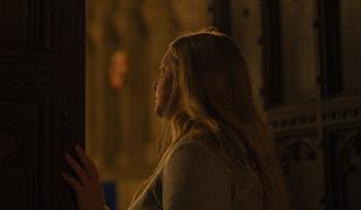 A woman peering out of one the Cathedral’s secret spaces that are rarely open to the general public.