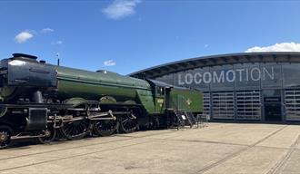 Locomotive outside of Locomotion's Collection Building