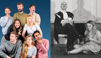 A group of eight adults (Up the Antics) pose against a blue background in a playful, staged manner. They are arranged in a pyramid-like formation